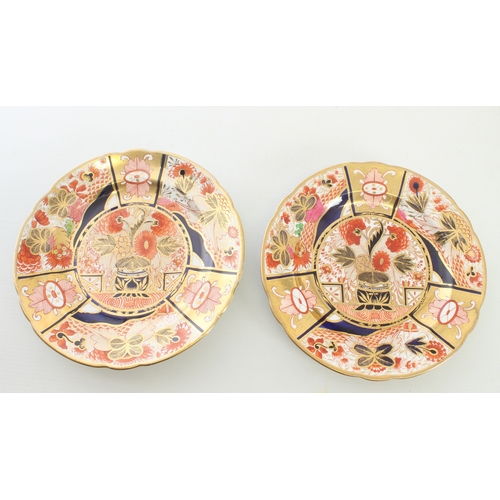 19 - A small collection of mid-19th century Imari decorated English porcelain - including a Spode two han... 