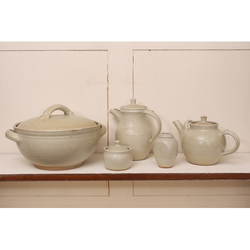 1036 - Winchcombe Pottery: five pieces of stoneware studio pottery - in a mottled cream glaze, comprising a... 