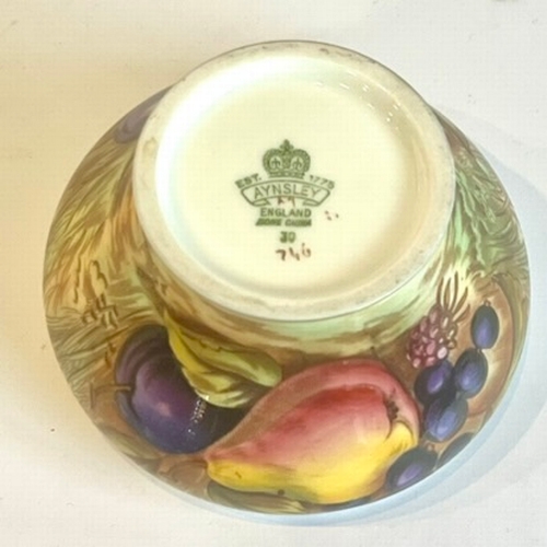 77 - An Aynsley 'Orchard Gold' fruit painted part tea and coffee service - green printed factory marks, w... 