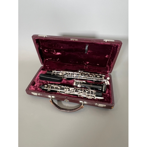 A cased Hans Kreul (of Tubingen) African blackwood oboe - serial