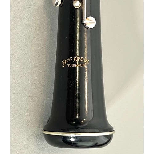A cased Hans Kreul (of Tubingen) African blackwood oboe - serial