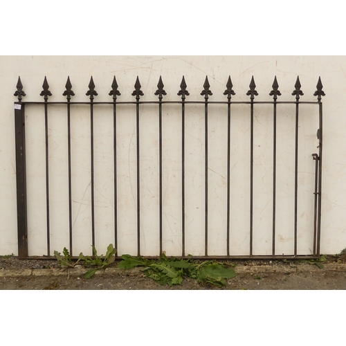 Two sections of short railings with arrow spikes, both sections ...