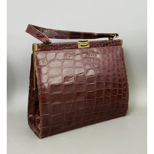 Four vintage handbags including a brown crocodile frame bag with single ...