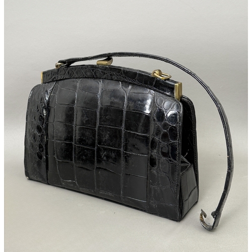 Four vintage handbags including a brown crocodile frame bag with single ...