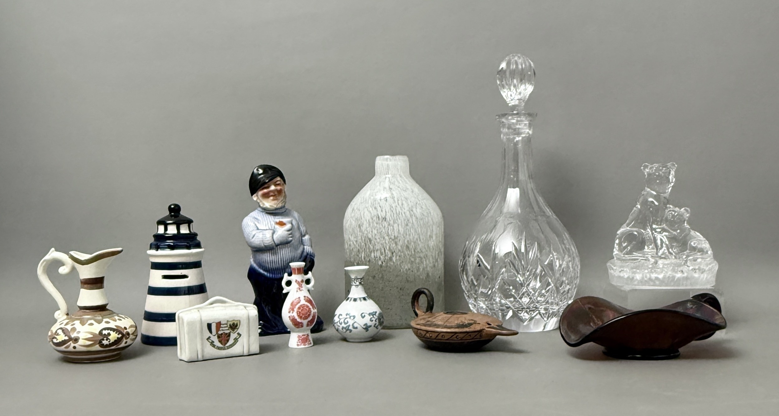 A small group of ceramics and glass - including a mottled white and ...