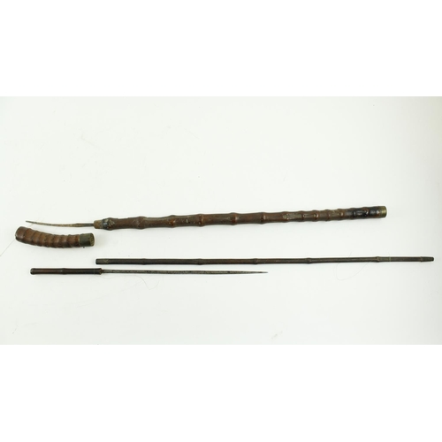 482 - A 19th Century bamboo design Walking Stick, with concealed dagger, approx. 85cms (33 1/2