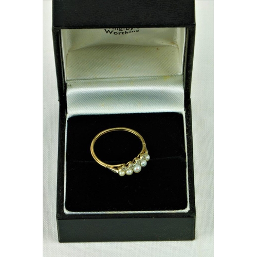 512 - An 18ct gold Ring, with five graduating pearls, set with .1ct of diamond chips, size L 1/2. (1)... 