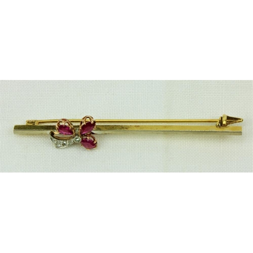 526 - An 18ct gold ruby and diamond Brooch Set, with five old cut diamonds creating a floral design (ruby ... 