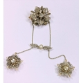 A fine quality Victorian Garniture of Jewellery, (possibly Russian) including an attractive floral d... 