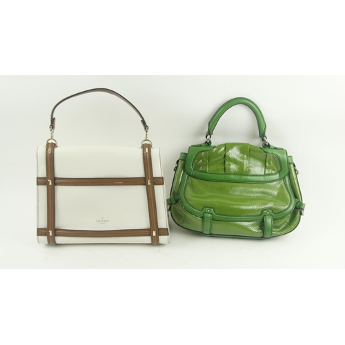 546 - A green leather Handbag, by Celine bearing logo 