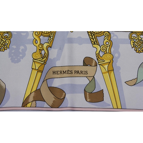 547 - Hermes, Paris:  An attractive silk Scarf, with horse and jockey in centre, approx. 33