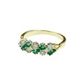 A fine quality ladies Cluster Ring, with eight diamonds and emeralds of variant sizes, set in gold b... 