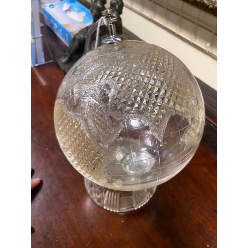 549 - A Waterford crystal etched model of a Globe of the World, on shaped base. (1)