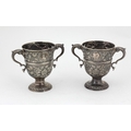A fine quality and heavy pair of 18th Century English silver two handled Cups, with 