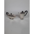 A modern Sheffield silver octagonal shaped Teapot and Coffee Pot, c. 1934, with wooden handles, appr... 