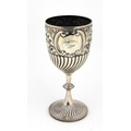 A tall silver Cup, with repouss decoration and inscription 'North Wales Horse Show, Chester 1905', ... 