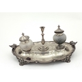 An attractive and unusual engraved silver Desk Ink Stand, with two cutglass bottles, (1 damaged) and... 
