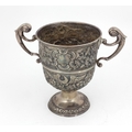 An 18th Century Irish silver two handled Cup, with repouss decoration depicting eagles, fruit, flow... 