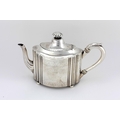 A fine large Irish  bright-cut silver Teapot, Dublin c. 1780, with silver handle and ball feet, appr... 