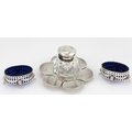An attractive pair of Sterling silver oval Salt Pots, with pierced decoration in the Adams style, li... 