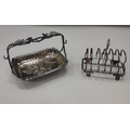A William IV English silver Toast Rack, with shell decorated feet by Joseph Angel & Joseph Angel... 