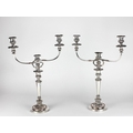 A very fine pair of 19th Century silver plated (on copper) two branch three light Candelabra, with g... 