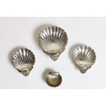 A set of 4 silver graduating shell design Dishes, approx. 7 ozs. (4)