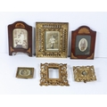 A collection of various Picture Frames, including three carved and pierced giltwood frames, two inla... 