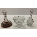 A cutglass Ships Decanter, with silver mounted top and a stopper, another cutglass Decanter and stop... 