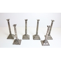 A very good set of 4 matching early 19th Century silver plated Corinthian style Candlesticks, the pr... 