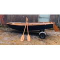 A 11' Mirror Sailing Boat, with sails, oars, canvas cover, and a two wheel trailer. (1)