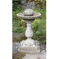 An attractive composition circular Bird Bath, on stepped square base, together with an  egg shaped W... 