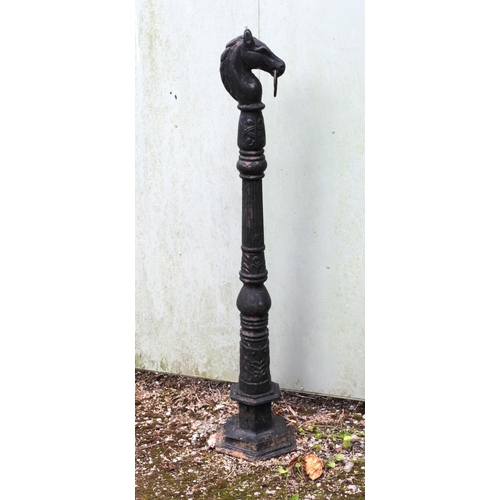 40 - A pair of heavy Victorian style cast iron Garden Posts, modelled as horse heads, on reeded pillar up... 