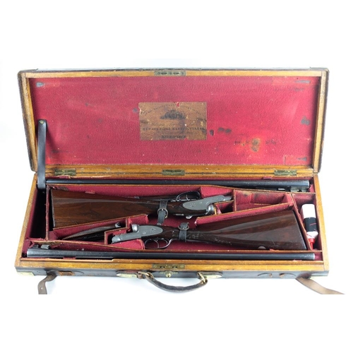 44 - A fine cased pair of 12 bore double barrel Shotguns, by Wm. Powell, No's 1 & 2, Serial No's 9939... 