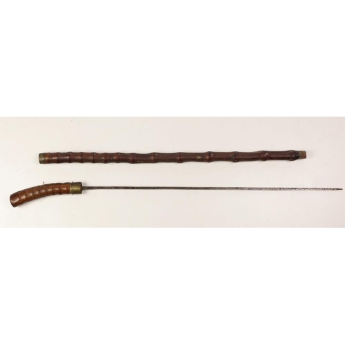 26 - A 19th Century bamboo design Walking Stick, with concealed dagger, approx. 85cms (33 1/2