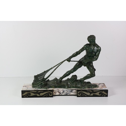 687 - An attractive Art Deco period assimilated bronze Figure of a semi-nude Fisherman dragging a net, on ... 