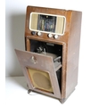 An old upright Pye Radiogram, walnut case, and a later chest shaped G.E.C. ditto. As a lot, w.a.f. (... 