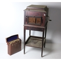 A standard Edwardian walnut cased Gramophone on stand, a small cased Table ditto and a large collect... 