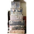 Seven old tin Travel Trunks & Deed Boxes, some with names on brass plaques etc., an old leather ... 