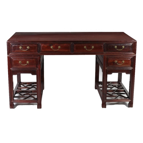 142 - A mid-19th Century Tielimu (Ironwood) six drawer three part Scholars Chinese Desk, with raised panel... 