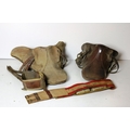A full size leather Saddle by Bernie, Kilcullen, three other Saddles (dam), and a collection of Hors... 