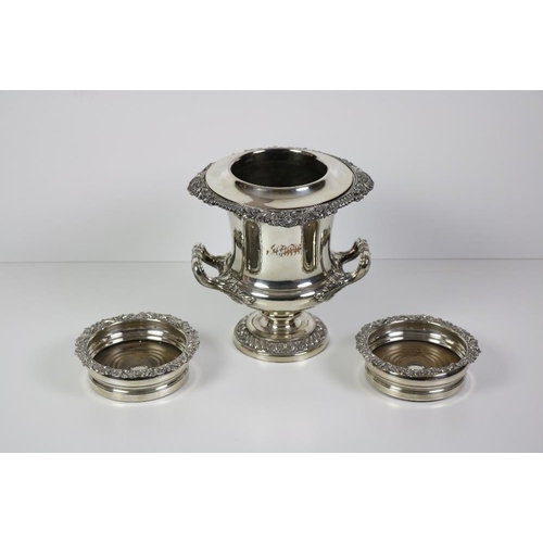 106 - A good mid-19th Century heavy two handled Wine Cooler, with embossed gadroon and shell decoration, s... 