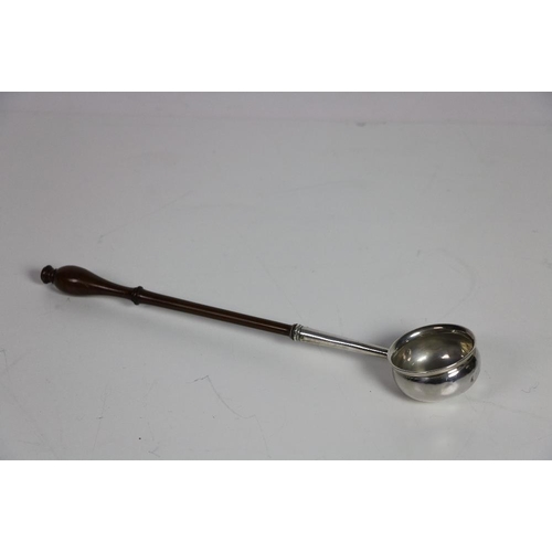 125 - An early 19th Century English silver Punch Ladle, with turned wooden handle, London c. 1806, by J.C.... 