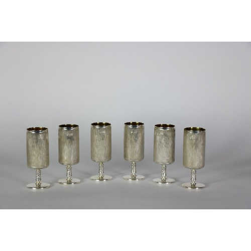 131 - An unusual set of 6 Royal Irish silver Goblets, with gilded interiors, on circular bases, approx. 54... 