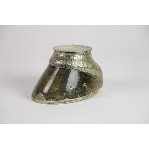 133 - A horse hoof Inkwell, with silver plated mounts. (1)