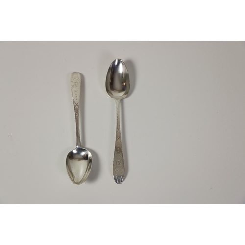 142 - A fine pair of Irish George III silver bright cut Table Spoons, Dublin 1788, by John Stoyte, 23cms (... 