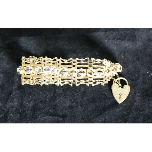 154 - An attractive Edwardian 9ct gold shaped link Bracelet, set with sapphire and diamond type stones, an... 