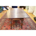 A 19th Century Irish mahogany extendable Dining Table, with four spare leaves, on turned legs, appro... 