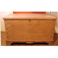 A good 19th Century stripped pine Coffer, with wrought iron hinges etc., and with shaped apron on br... 