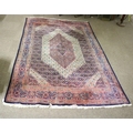 A fine small Persian Carpet, with treble centre medallion with all over floral pattern inside a conf... 